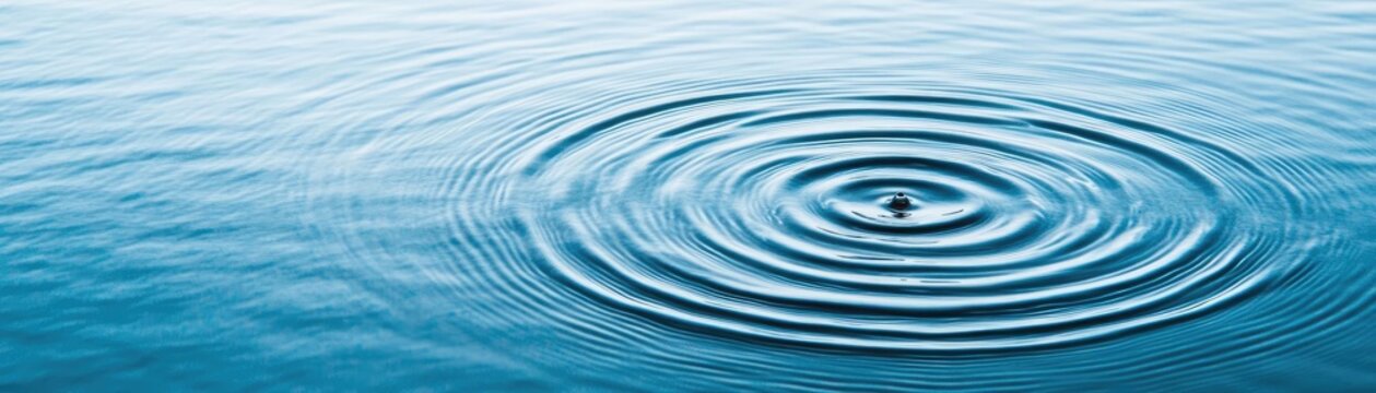 Raindrops hitting the surface of a calm lake, causing ripples that expand outward in perfect circles, raindrops and ripples, gentle water power