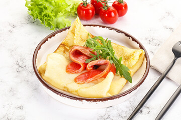 Russian pancake with salmon fish