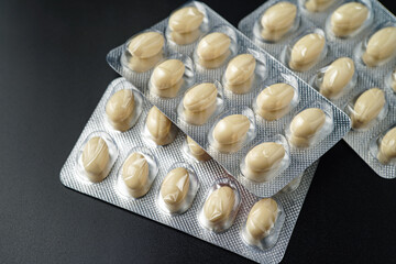 Oil filled blister pack white softgel capsules of food supplements, fish oil, omega 3, vitamin DHA
