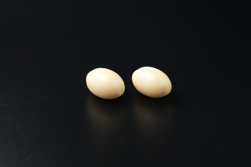 Vitamin in white soft gels capsules, Fish oil, omega 3, omega 9, vitamin D, vitamin E