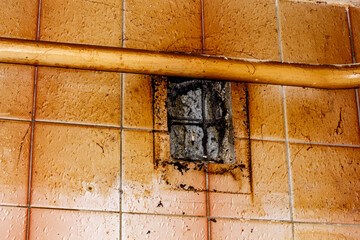 Apartment cleaning. Washing tiles from grease and dirt.