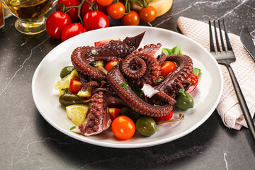 Salad with octopus tentacle and vegetables
