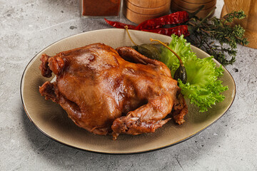 Baked small chicken with spices