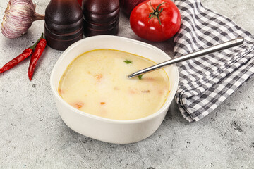Salmon cream soup with vegetables