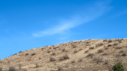 blue sky and clouds  over the mountains , Tbilisi, Georgia. 