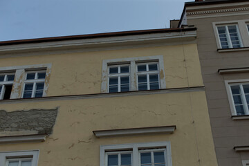 This is a building featuring a significant number of windows, allowing light to flood the interior and providing views of the outside