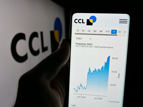 Stuttgart, Germany - 10-02-2024: Person holding cellphone with webpage of packaging company CCL Industries Inc. on screen in front of logo. Focus on center of phone display.