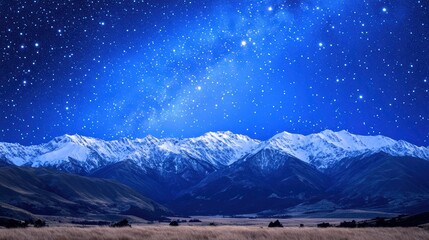 Starry night -capped mountains valley