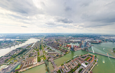 Rotterdam, Netherlands. Panorama of the summer city in rainy weather. Clouds. Aerial view