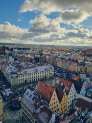 Fototapeta premium Panoramic view to Wroclaw from St Elizabeth church tower in Wroclaw, Poland. Best viewpoint in Wroclaw. Wroclaw roofs from above. 