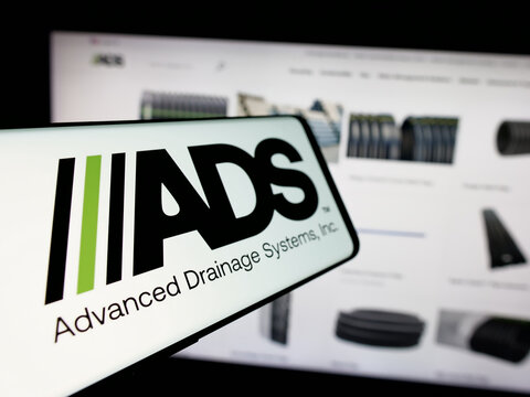 Stuttgart, Germany - 10-08-2024: Smartphone with logo of US company Advanced Drainage Systems Inc. (ADS) on screen in front of website. Focus on center-left of phone display.