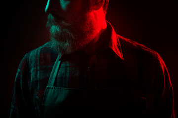 Photo close up of halloween male character strong creepy maniac isolated on dark misty mysterious...