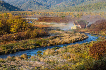 autumn landscape with river and mountains