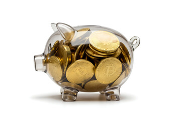 A piggy bank filled inside with bitcoin, isolated, white background. Concept for US crypto treasury reserve, beating inflation, investing, saving, accumulating, creating wealth with cryptocurrencies.