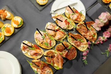 table Buffet Dishes. Bruschetta served at the catering