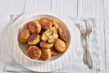Northern Pike fish cakes in a white bowl
