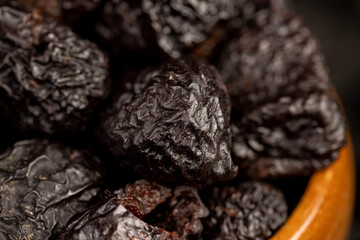 ripe purple plums and dried plums
