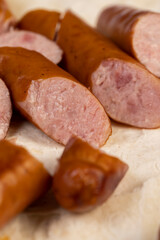 fried pork sausages on a wheat tortilla