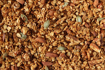 Freshly Baked Granola. Oat Granola with Almonds, Walnuts, Sesame and Pumpkin Seeds. Morning Nutrition.