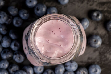 fresh cold yogurt with the taste and berries of ripe blueberries