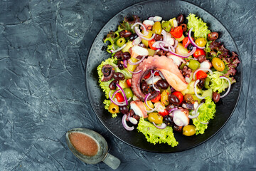 Fresh and healthy octopus salad with potatoes.