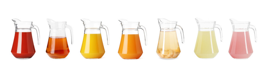 Glass jug with with different juices isolated on white, set