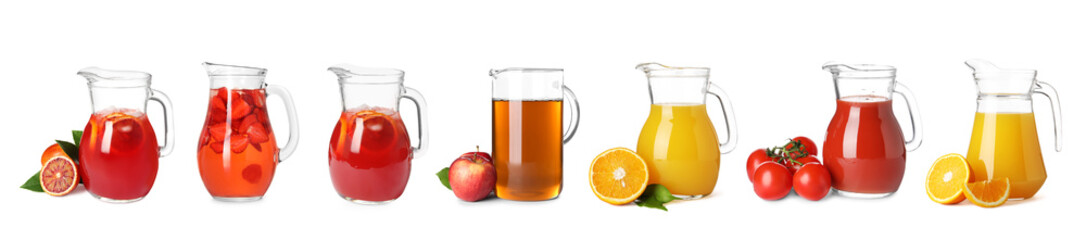 Glass jugs with different juices isolated on white, set