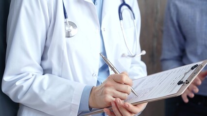 Doctor reviewing patient's medical records