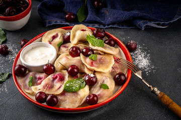 Traditional West Europe cherry pierogi dumplings