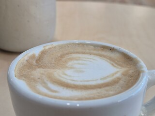 Cup of coffee close view background, breakfast with coffee