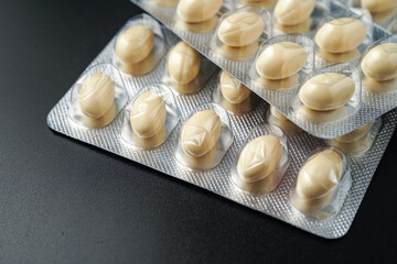 Oil filled blister pack white softgel capsules of food supplements, fish oil, omega 3, vitamin DHA