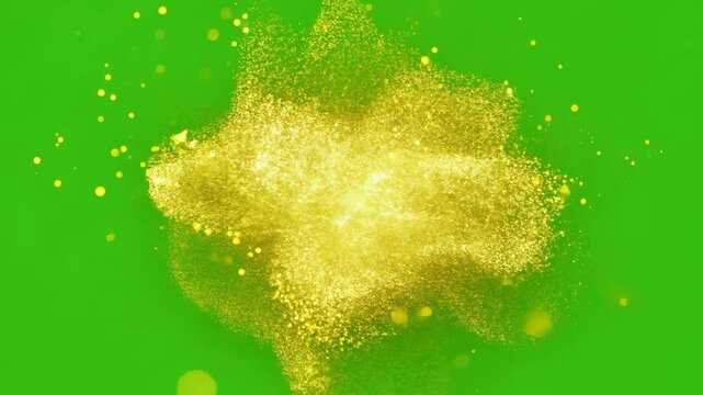 Golden glitter exploding on green screen background