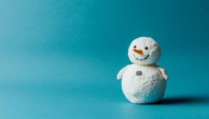 Obraz premium Snowman standing outside on a winters day, wearing a hat, scarf, and carrot nose. Landscape of a snowy forest.