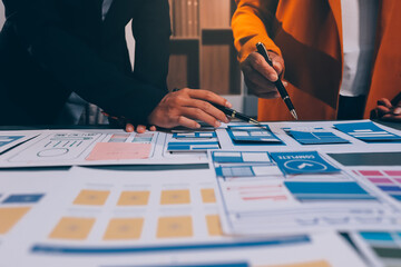 The designer team is designing the uxui system to make the uxui system work well on new phones and support system updates. Website development concept UI UX front end designer