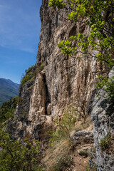 Ottorino Marangoni - Monte Albano Via Ferrata (Klettersteig ) in the Alps offers a thrilling climb, sports tourism, above Mori town, near Lago di Garda, Trentino, Italy.