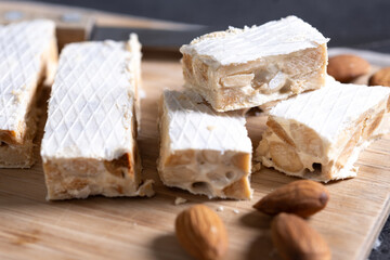Christmas almond nougat on black slate background