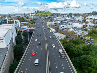 Aerial: Newmarket motorway overpass and retail stores, Auckland, New Zealand