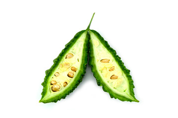 Cut lengthwise of Fresh bitter melon (Momordica charantia L., Bitter cucumber) isolated on white background top view flat lay stacking