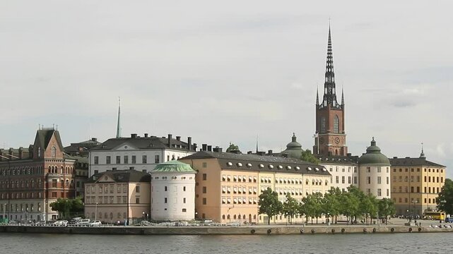 Long shot of Stockholm, the capital of Sweden. The Birger Jarl's Tower and the Riddarholmen Church in the background. Filmed from Stockholms Stadshus.