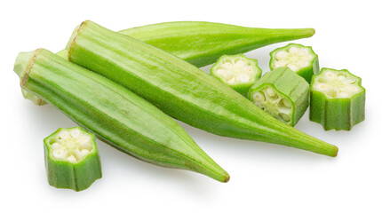 Okra green seed pods, and pieces of okra isolated on white background. File contains clipping paths.