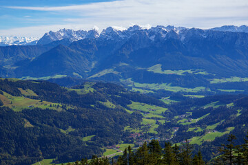 Naklejka premium Breathtaking views from Spitzstein, a popular hiking mountain (Bavarian-Tyrolean border), over the Inn Valley to the Kitzbühel Alps in classic autumn light