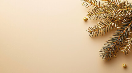Elegant golden Christmas tree branches adorned with decorative baubles on a soft beige background for festive celebrations