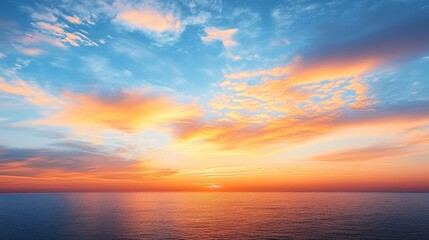 Obraz premium Golden Sunset Sky Over Ocean. Dramatic Sunset Sky With Burning Orange Clouds Over Calm Sea Horizon.