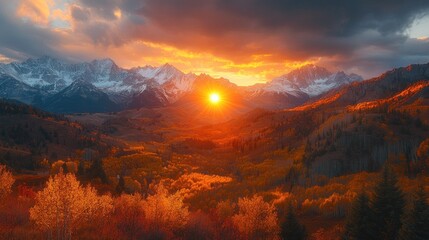 A breathtaking view of a mountain range with snow-capped peaks in the distance, bathed in the warm glow of a sunset. The foreground is a dense forest with vibrant autumn foliage.