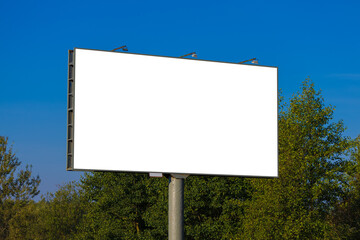 White billboard along the highway. Background for design and advertising. 