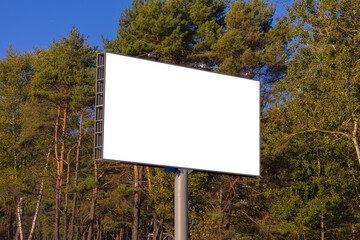 White billboard along the highway. Background for design and advertising. 