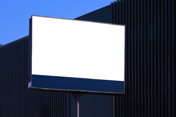 Background for design. Advertising billboard along the road in the city on a sunny day