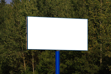 Background for design. Advertising billboard along the road in the city on a sunny day