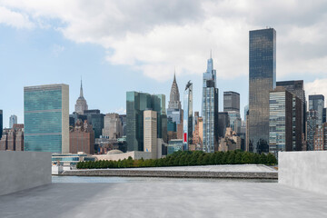 Urban skyline of New York City with modern architecture and greenery.