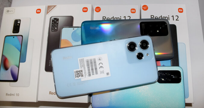 Kyiv, Ukraine. 10.10.2024:Various Xiaomi Redmi smartphones displayed together, showcasing the Redmi 10 and Redmi 12 models in a retail setting. Stock editorial photo.